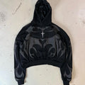 Unisex Black Cropped Tribal Graphic Hoodie - primary photo, shown with a person (1 of 4)