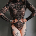 Women's Nude Skeleton Print Mock-Neck Bodysuit - primary photo, shown with a person (1 of 3)