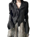 Women's Black Crinkle Lapel Bell-Sleeve Blouse - primary photo, shown with a person (1 of 3)