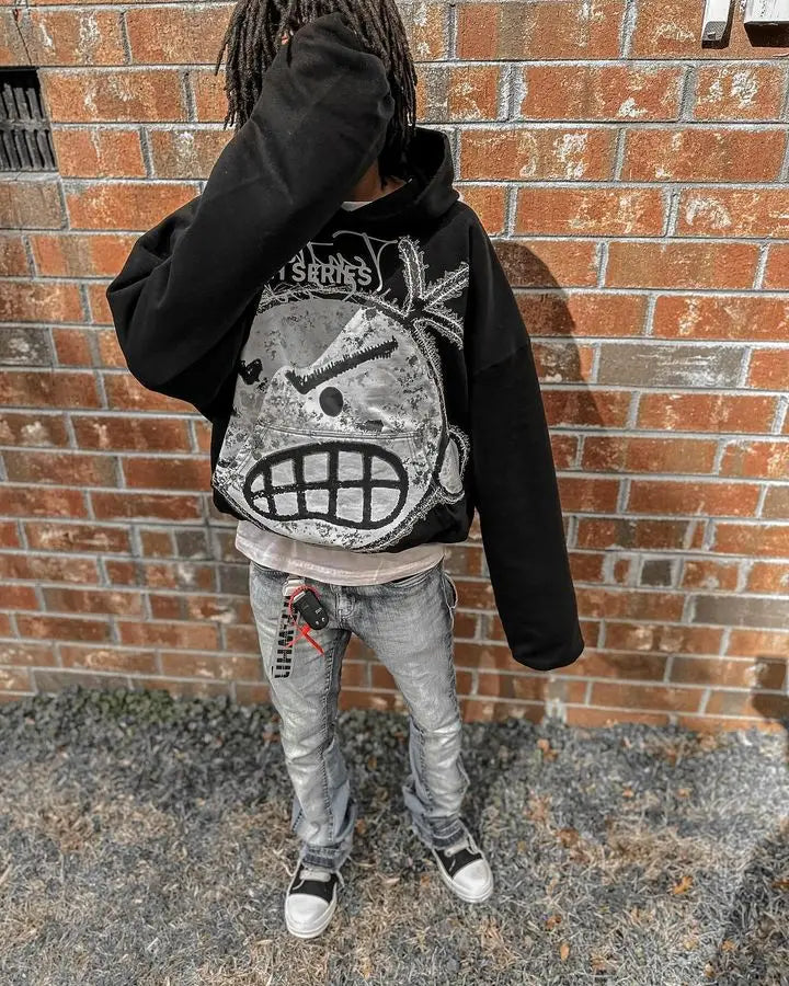 Unisex Oversized Hoodie - primary photo, shown with a person (1 of 3)