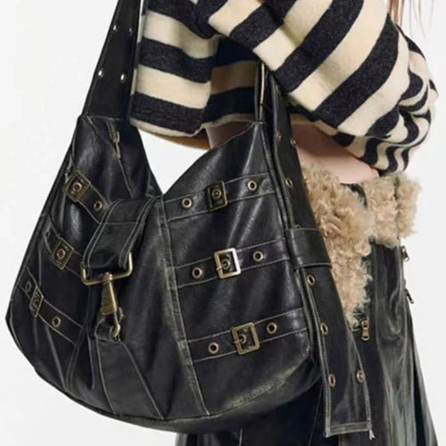Women's Black Buckle-Strap Hobo Shoulder Bag - primary photo, shown with a person (1 of 3)