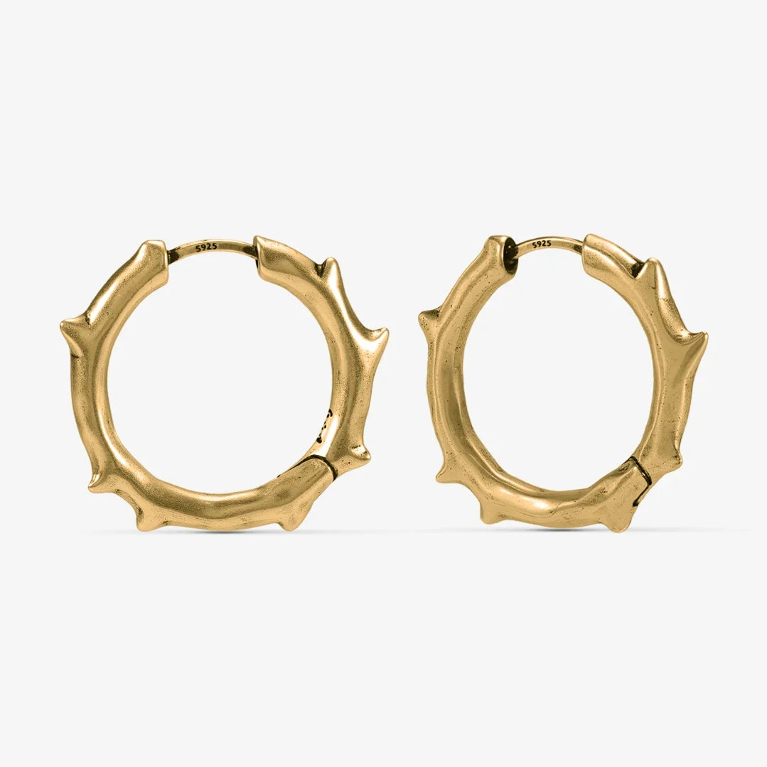 Gold-tone Ancient Thorn Hoops feature thorn-shaped spikes and an antiqued finish.
