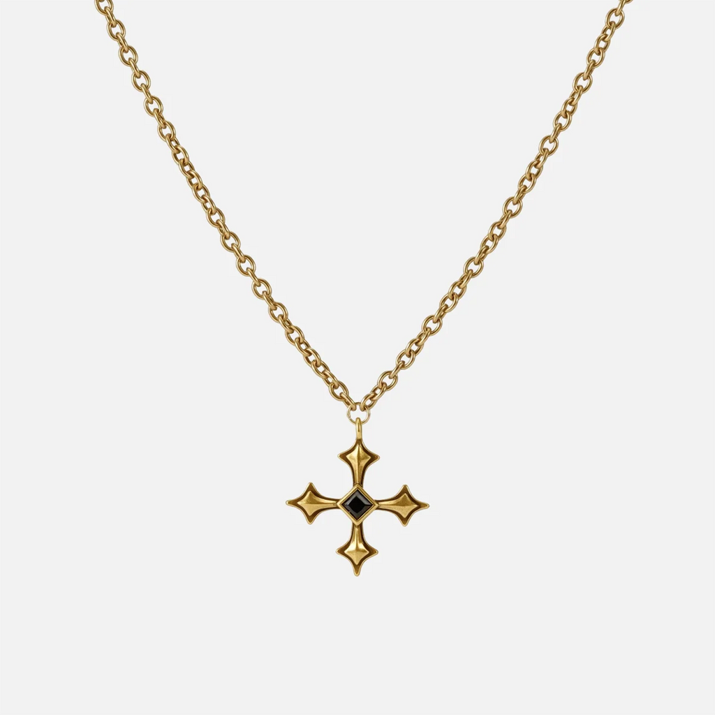 Black Testament Necklace in antiqued 18K gold with a gothic cross pendant and black obsidian, shown full length on white.