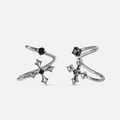 Bound Vestige Ear Cuffs in antiqued silver with black obsidian and cross-inspired metalwork on a white background.