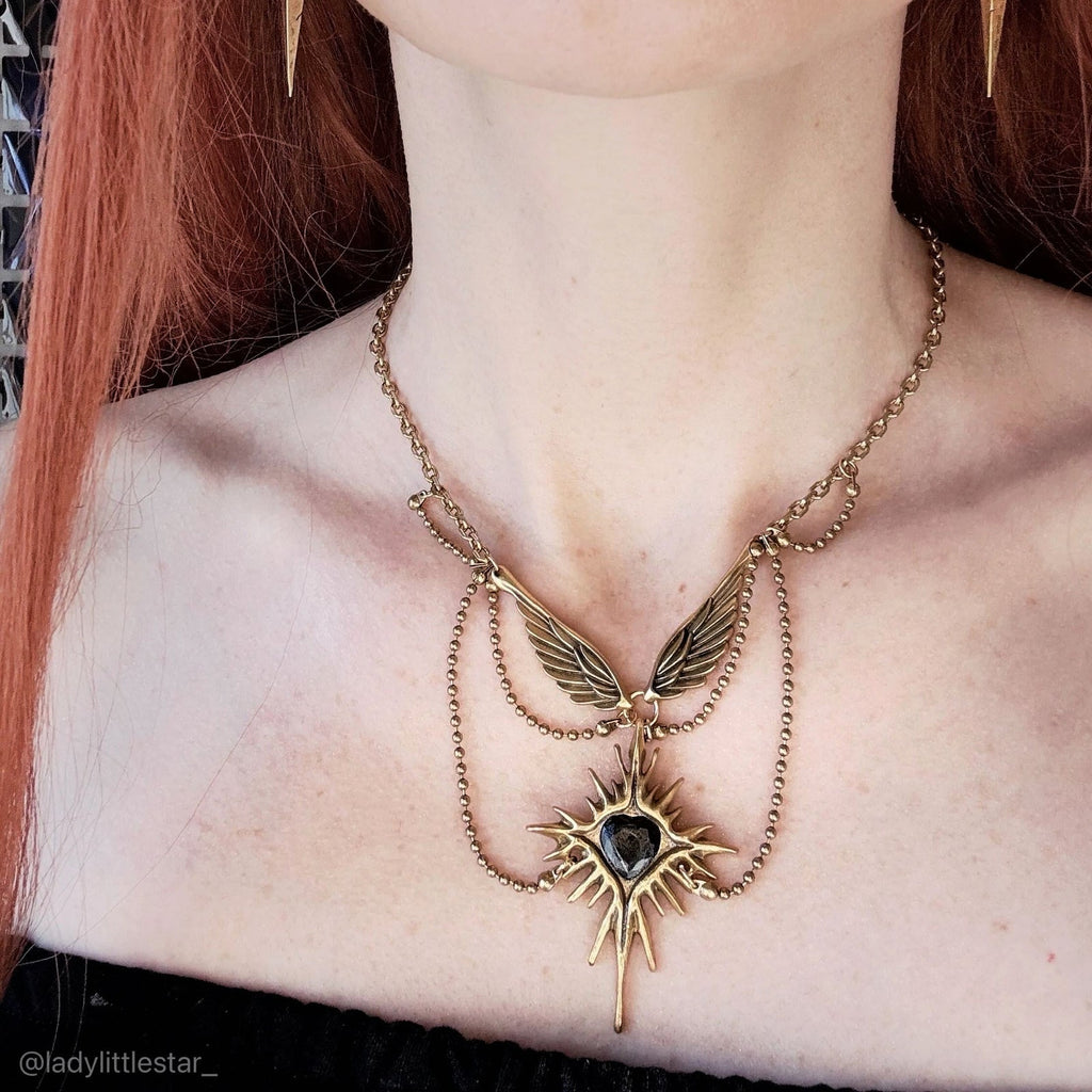 CELESTIAL STARBURST WINGS NECKLACE