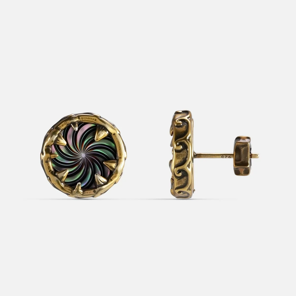 Gold Charybdis Maw Ear Studs with abalone shell spiral center, carved tooth-like rim, textured side detail, and flat back post on a clean background.