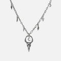 Crow Ward Necklace in silver plating with bird skull pendant, crescent moon detail, and antiqued finish