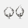 Silver-tone Enchanted Forest Whimsy hoop earrings with mushrooms, leaves, and woodland details