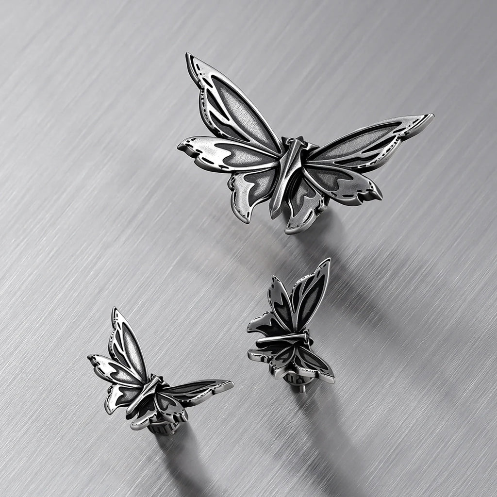 ETERNAL MOTH EAR STUDS