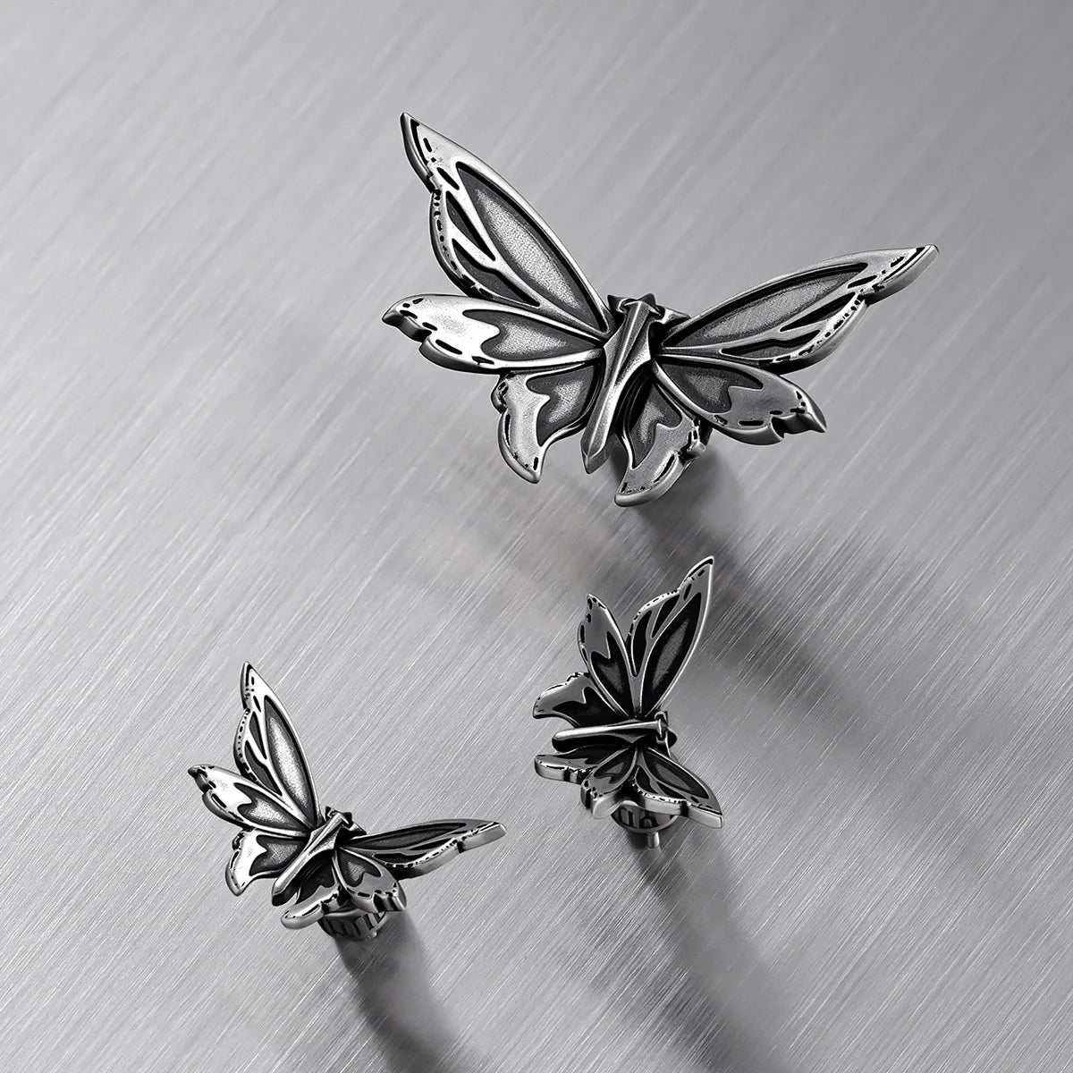 ETERNAL MOTH EAR STUDS
