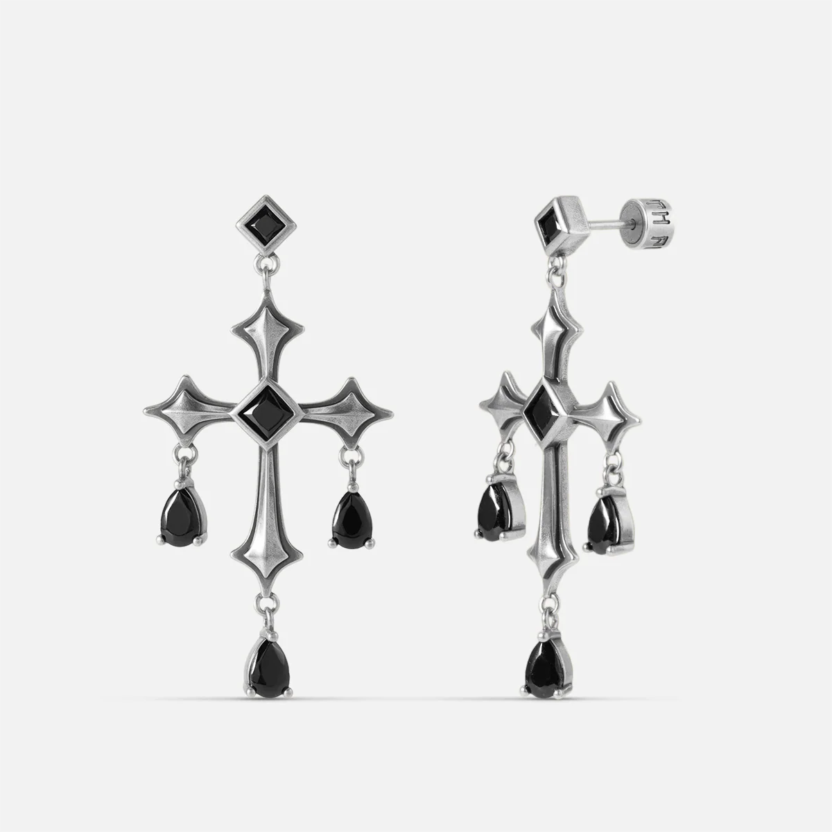 Forsaken Vow Earrings in antiqued silver with gothic cross-inspired drops and black obsidian, shown as a pair on white.