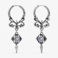Silver-tone Gothic Crest hoop earrings with ornate scrollwork, clear stones, and pointed drops