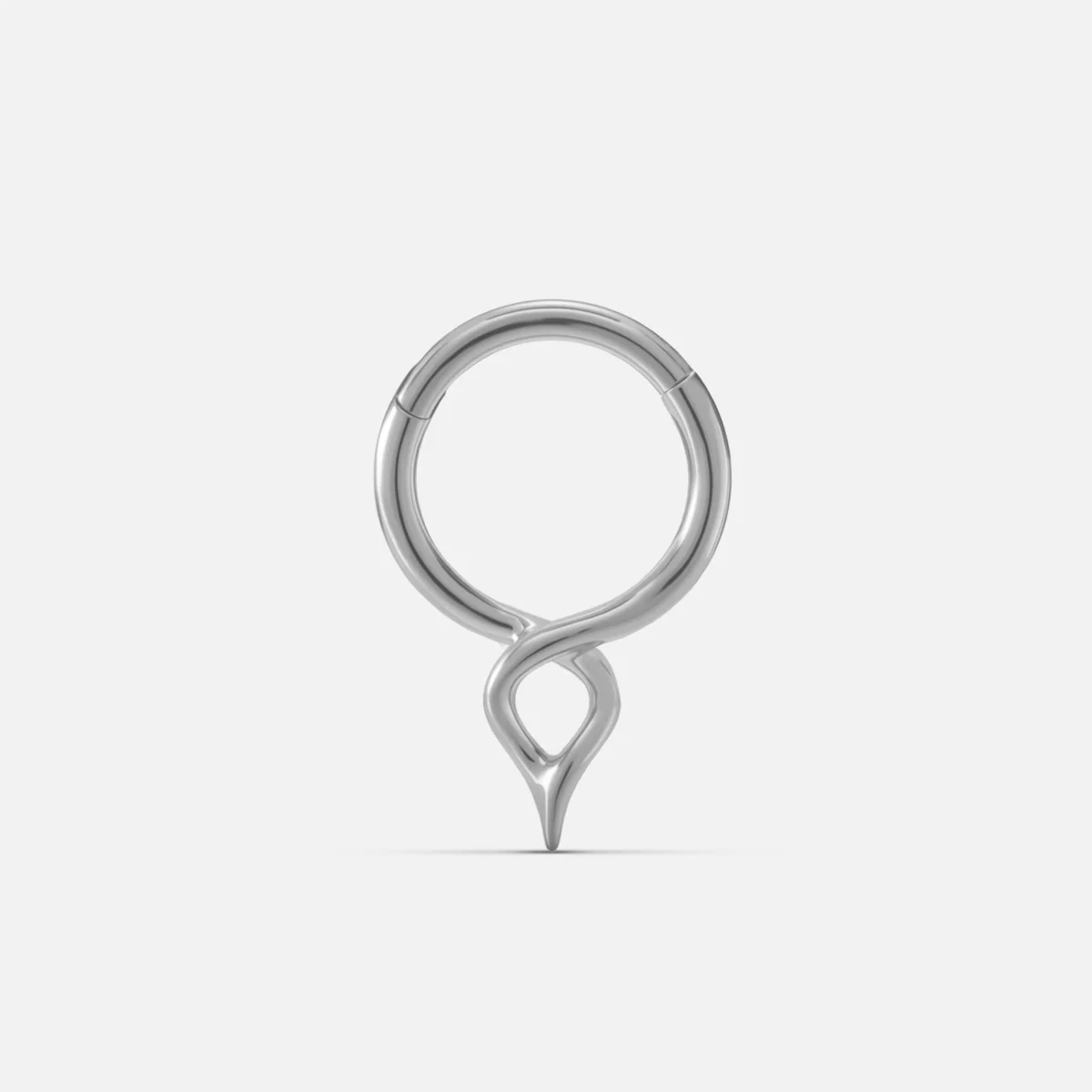 Silver-tone twist clicker ring with a small teardrop drop, shown front facing on a plain background