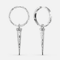 Pair of silver-tone hammered hoop earrings with tapered spike drops on a white background