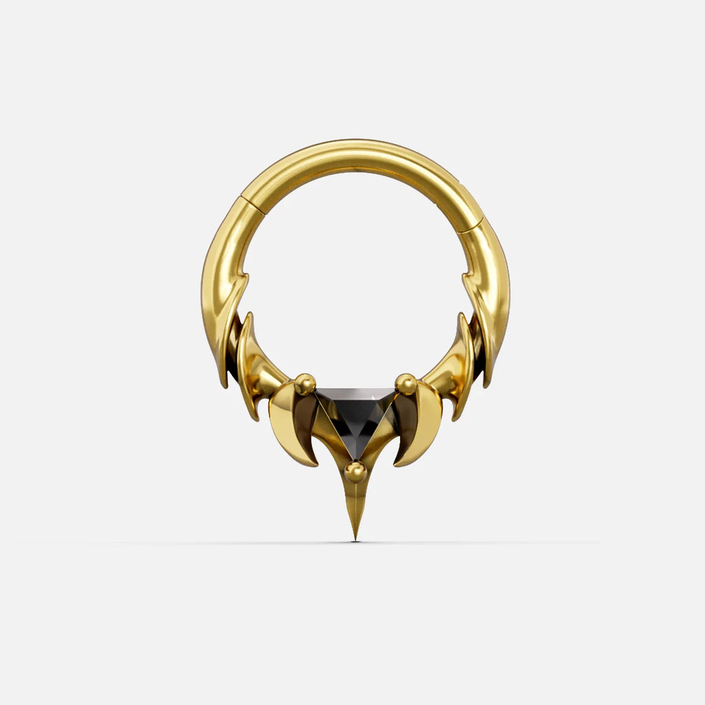 Gold-tone Keystone Ridge Clicker hoop featuring clawed talon design and dark triangular gem, front view