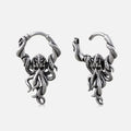 Silver-tone Kraken Mystique hoop earrings with detailed octopus pendants