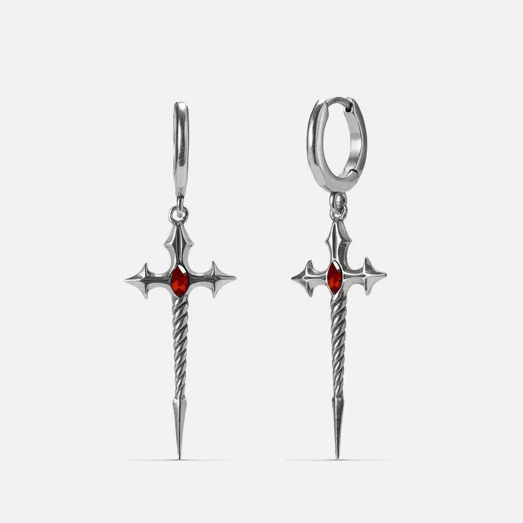 Longinus Godpiercer Earrings in 925 sterling silver, pair shown front and back on white, featuring red stone centers and twis