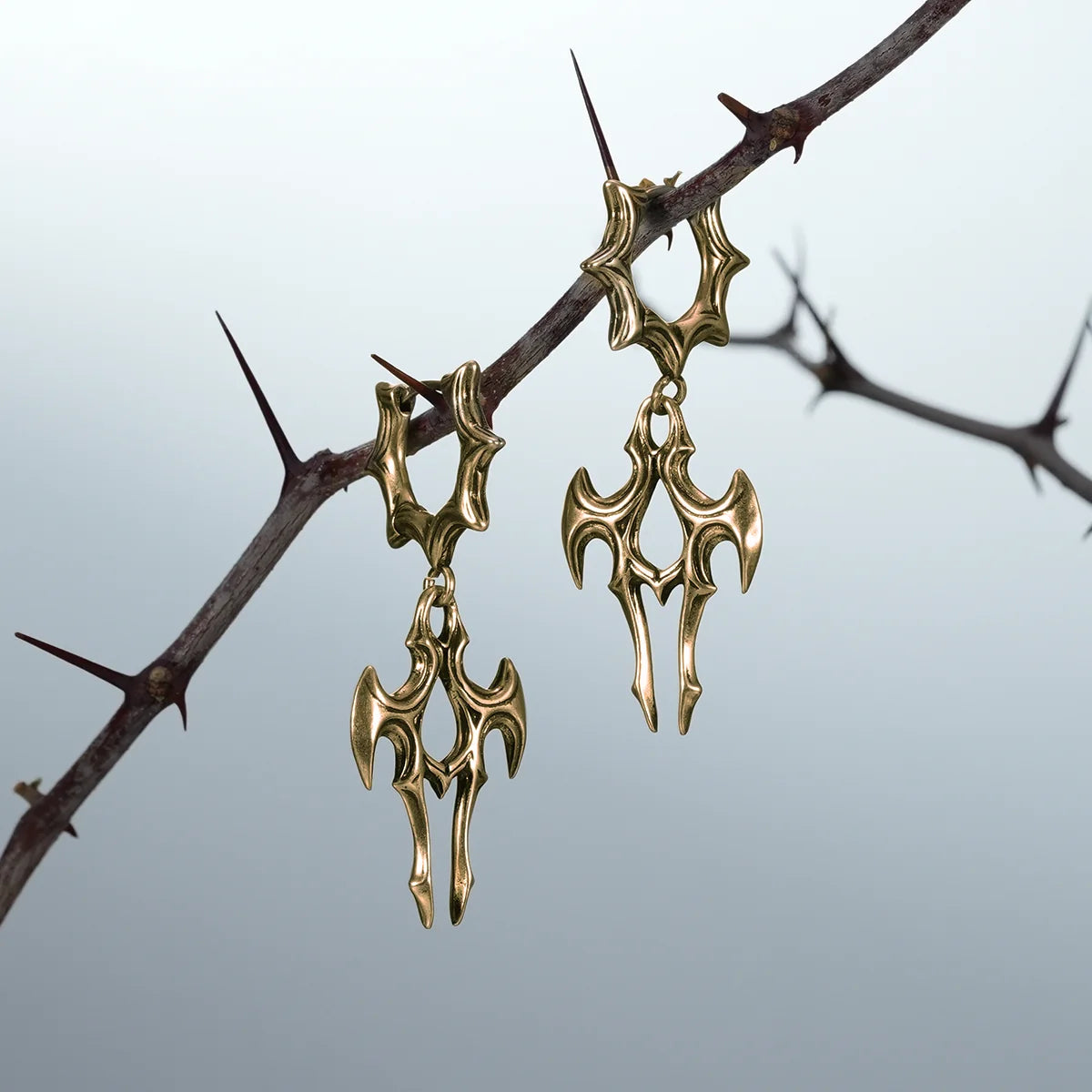 LONGINUS JUDGMENT TALON EARRINGS