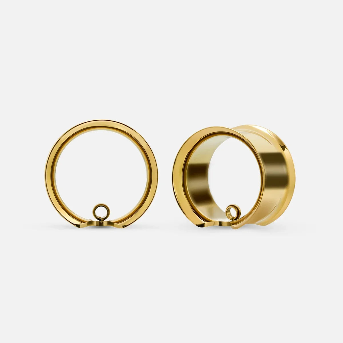 Gold-tone modular ring tunnel pair shown front and angled view with attached loop detail