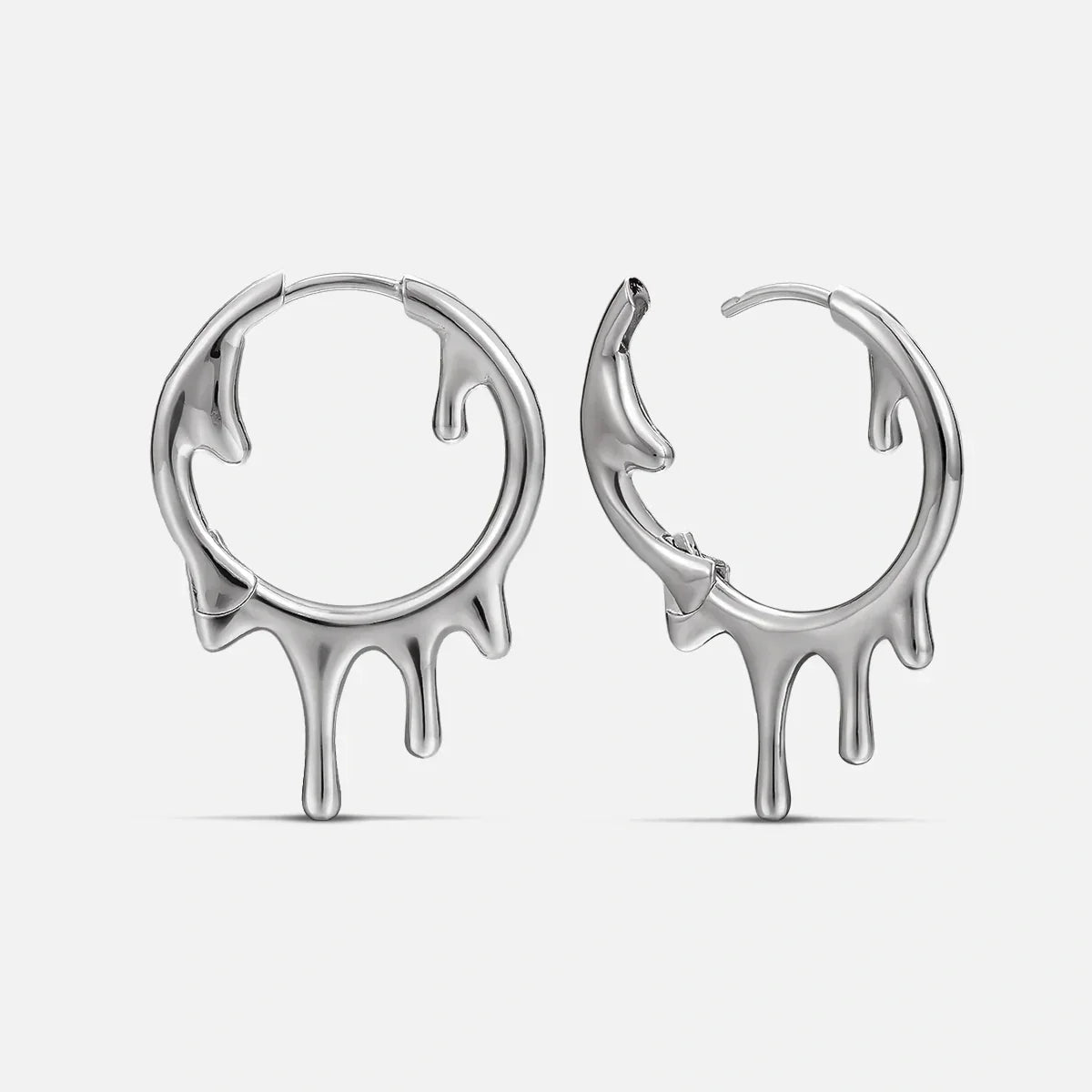 Silver-tone hoop earrings with a dripping melted design, shown front and side view as a pair