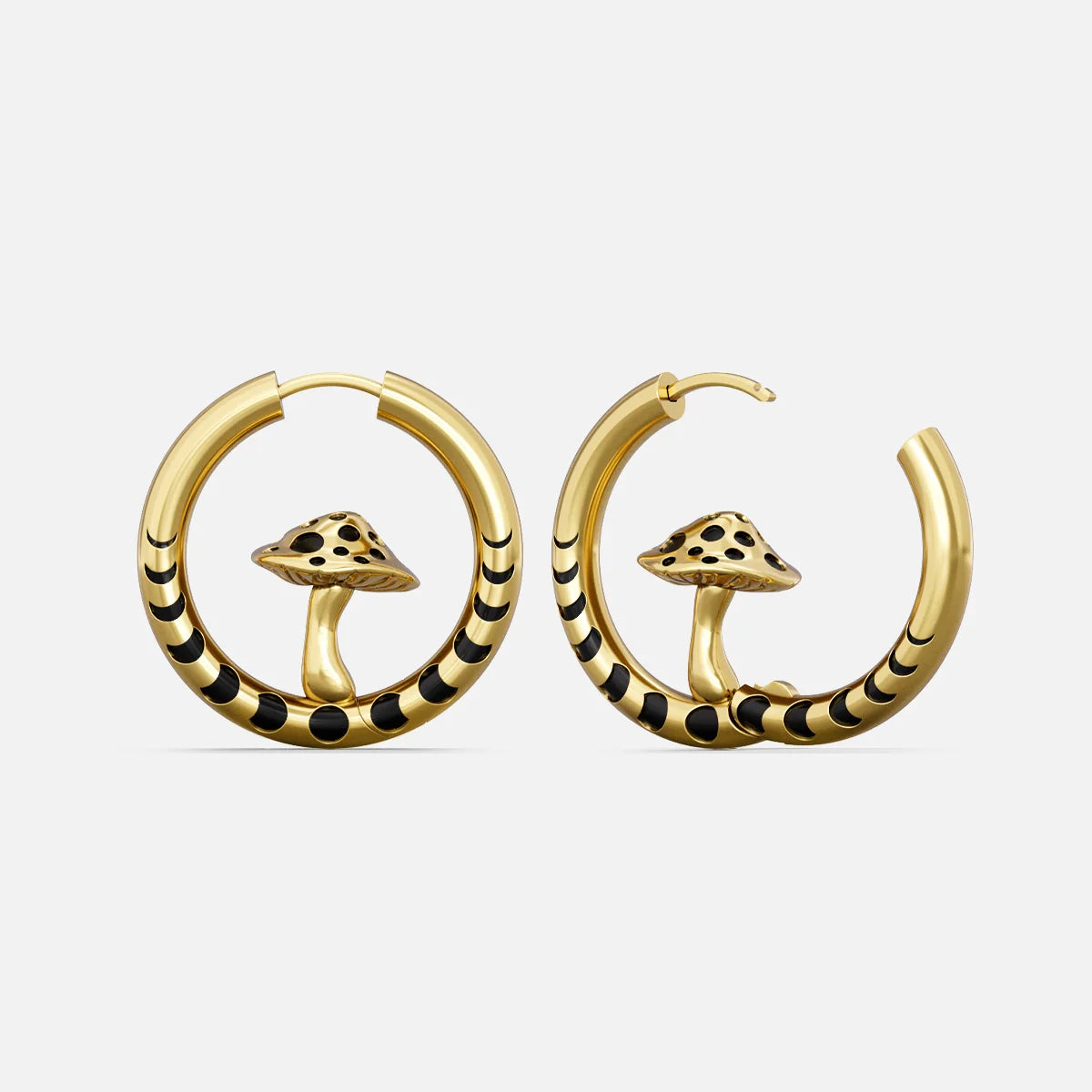 Gold-tone hoop earrings with black striped bands and a mushroom charm inside each hoop