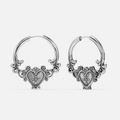 Silver-tone Ornate Affection hoop earrings with decorative heart-shaped centers