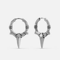 Silver-tone Primal Blade Earrings feature bone-textured hoops and sharp blade points.