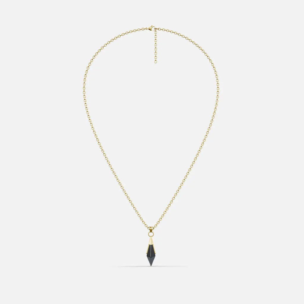 Gold-tone Prism Apex Necklace with a pointed black crystal pendant on a fine beaded chain.