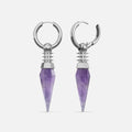 Silver Rivet Prism Earrings with faceted amethyst crystal spikes, studded cylindrical collars, polished hoops, and sharp vertical silhouette on a clean background.