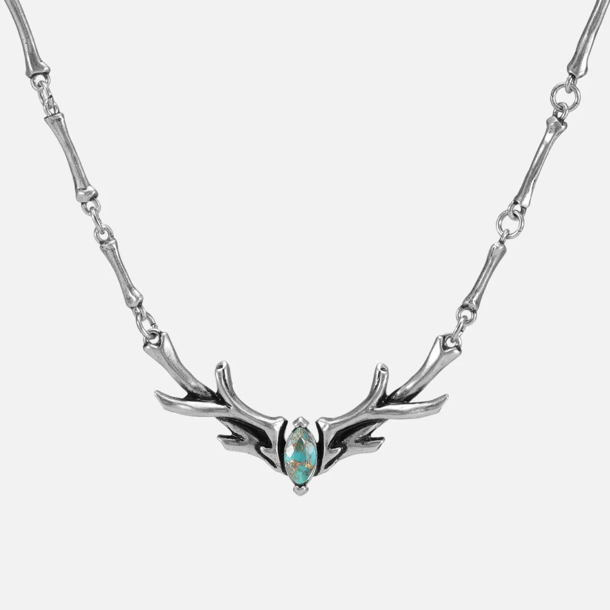 Sacred Antler Collar Necklace in silver plating with turquoise marquise stone and antler-inspired collar design