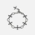 Silent Litany Bracelet in antiqued silver with gothic cross-inspired links and black obsidian, shown in a full circle on whit
