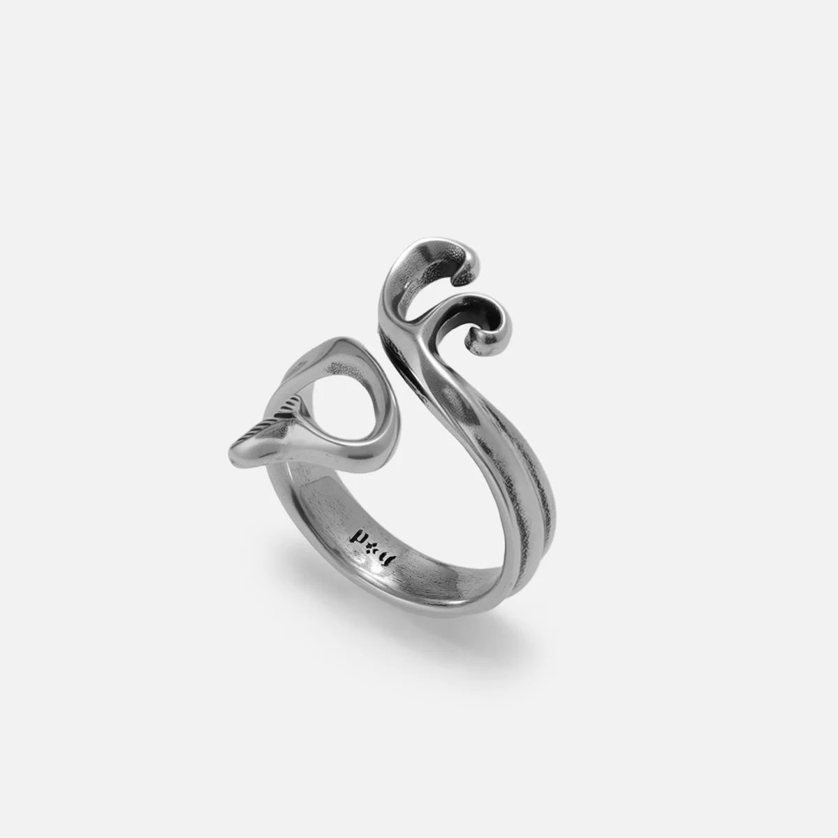 Siren tail ring in 925 sterling silver with antiqued finish showing fluid sculptural wave curve