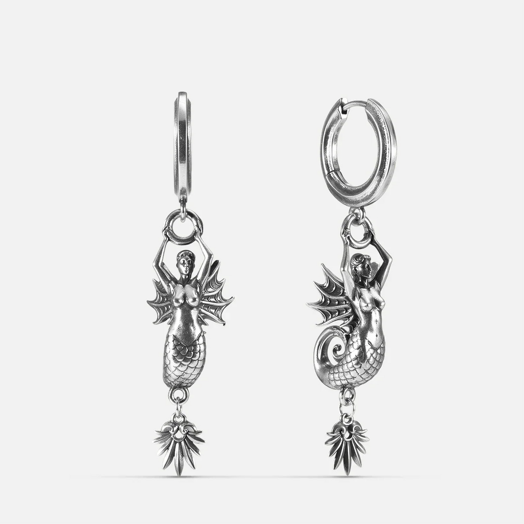 Silver Siren's Dirge Earrings with sculpted siren figure, scaled tail, sharp fins, dangling charm, and hoop design on a clean background.