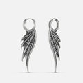 Silver Spined Wing Earrings with long ribbed wing drops, sharp fin-like ridges, and hoop design on a clean background.