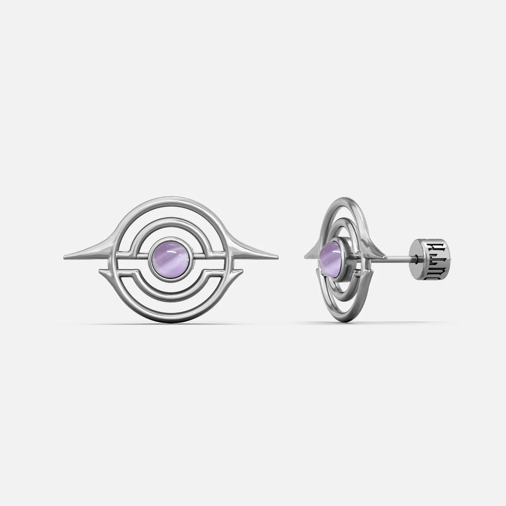 Silver-tone ear studs with concentric ring design and light purple stone center, front and side view