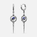 Silver-tone Stellar Orbit earrings with huggie hoops, orbit ring, blue stone center, and hammered spike drop