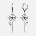 Silver-tone drop earrings with a star burst circle motif and blue stone center, front view pair