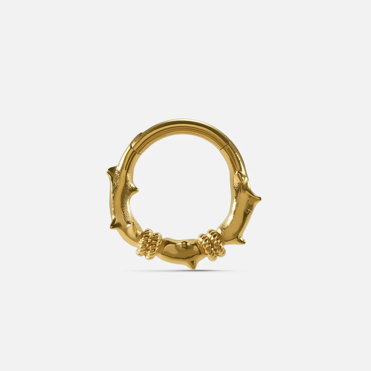 Thorn Bramble Clicker in 18K gold PVD titanium with sculpted thorn and bramble texture