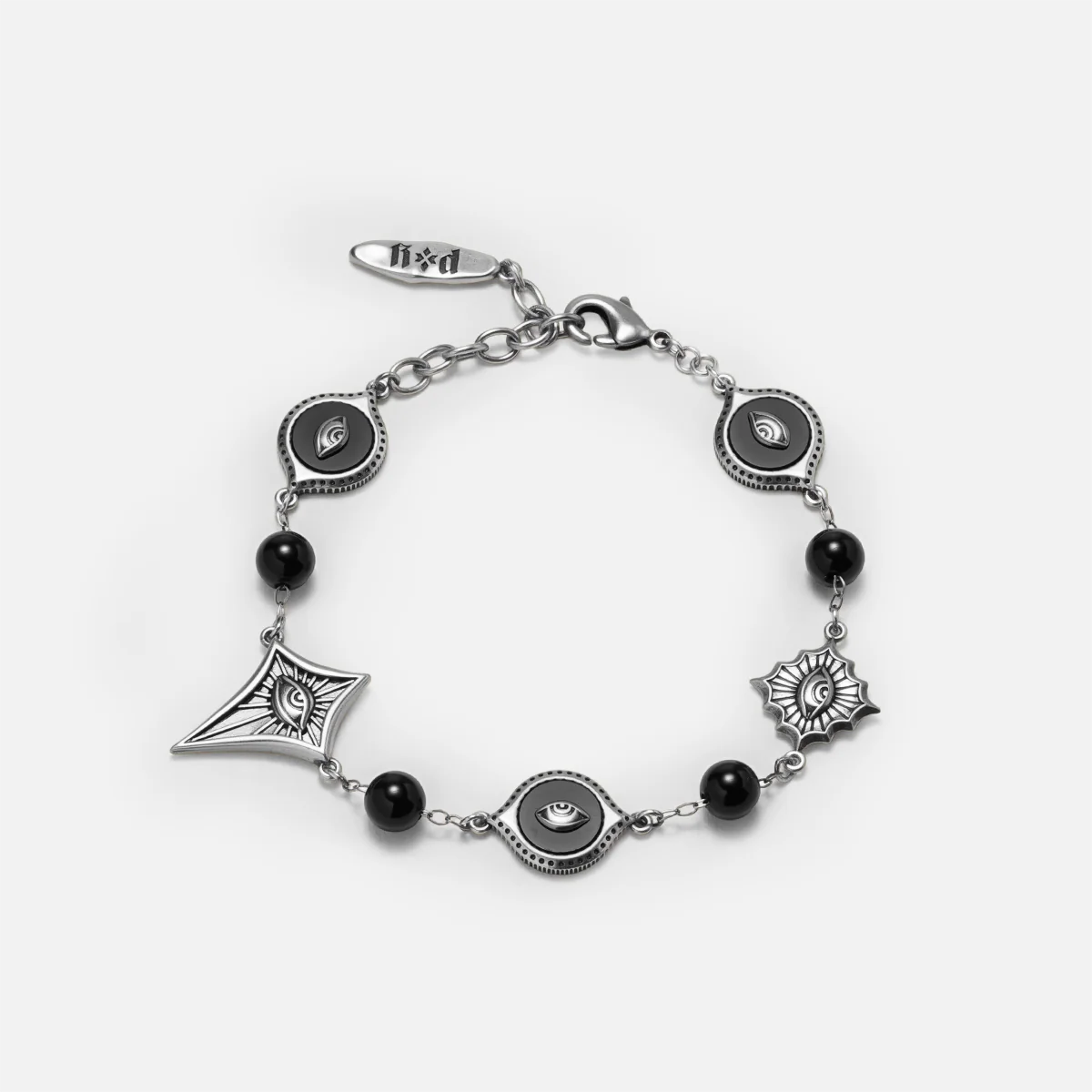 Antiqued silver-tone Unseen Orbit Bracelet with black obsidian beads, eye-shaped links, and sculpted eye medallions in pointed frames.