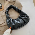 Women's Black Ruched Crescent Shoulder Bag - primary photo, shown with a person