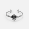 Antiqued silver-tone Veiled Seer Cuff Bracelet with a blindfolded face motif, pointed ornamental frame, and open cuff design.