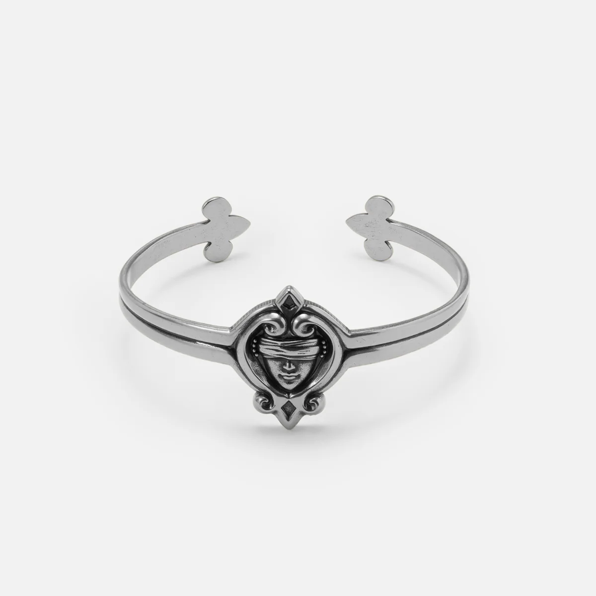 Antiqued silver-tone Veiled Seer Cuff Bracelet with a blindfolded face motif, pointed ornamental frame, and open cuff design.