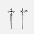 Vesper Blade Stud Earrings in antiqued silver with blade-shaped cross design and black obsidian, shown as a pair on white.
