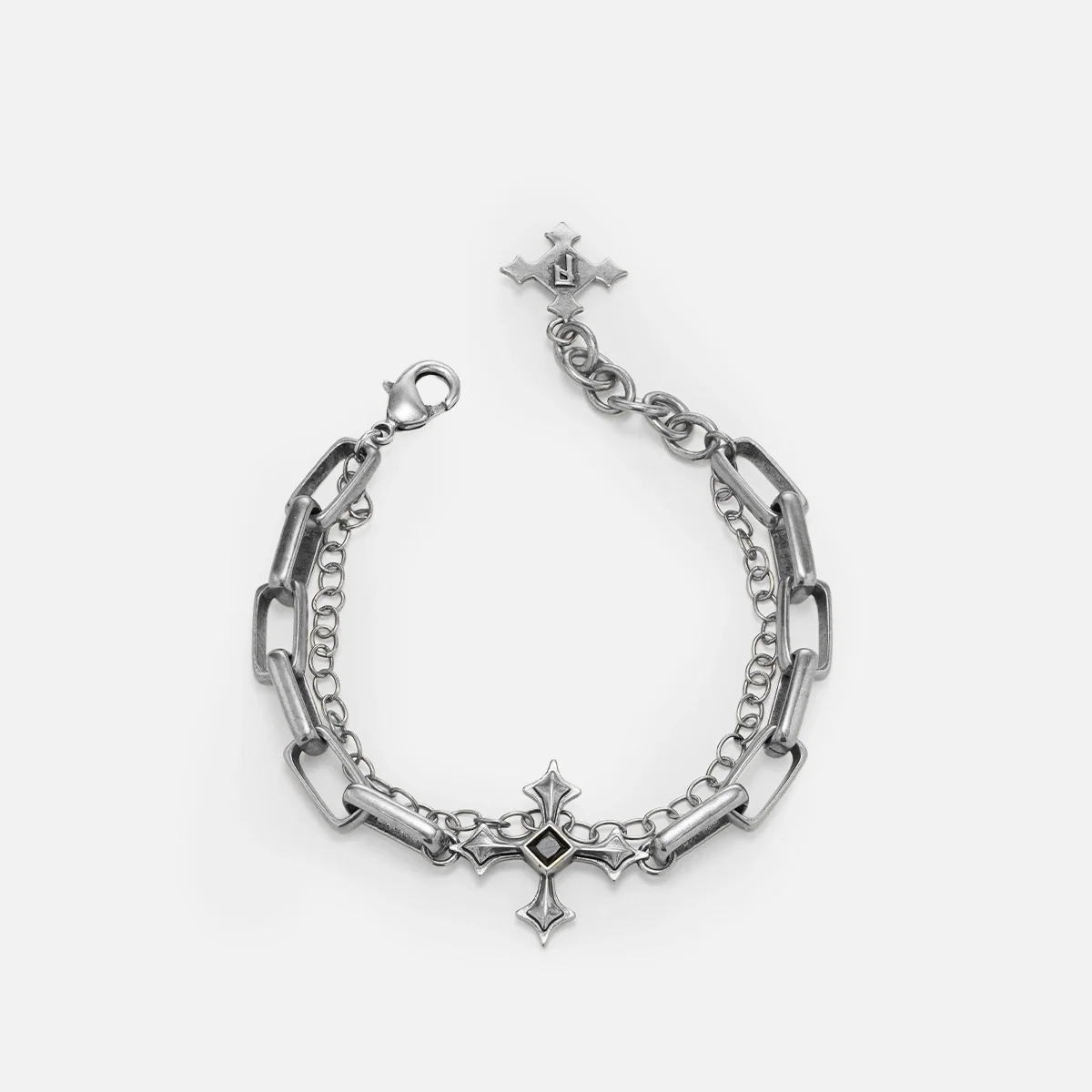 Vowbound Chain Bracelet in antiqued silver with gothic chain and cross-inspired black obsidian details, shown on white.