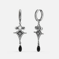Antiqued silver-tone Watcher’s Tear Earrings shown from front and side views with engraved eye motifs and suspended black teardrop accents.