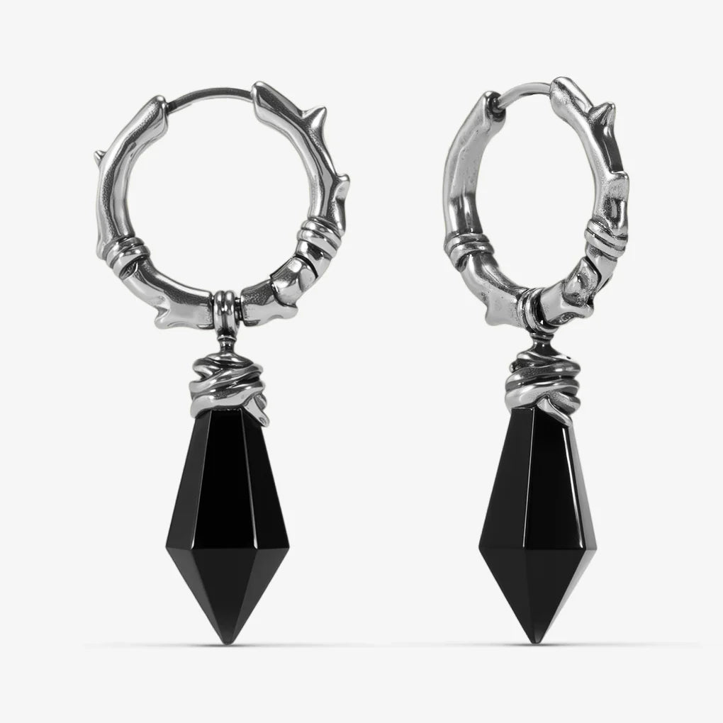 Silver Wrapped Relic Earrings with black obsidian dagger drops, hammered hoops, and wire-wrapped relic details on a clean background.